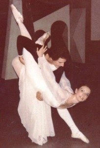 Sheila practicing with her partner during her professional ballet career.