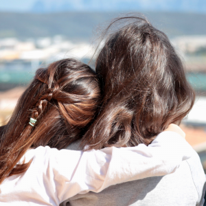 two girls hugging collaborative divorce